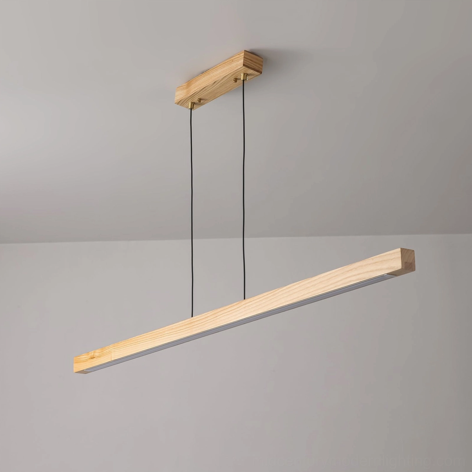 Side angled view of slanted linear wooden pendant light with natural wood finish on neutral background
