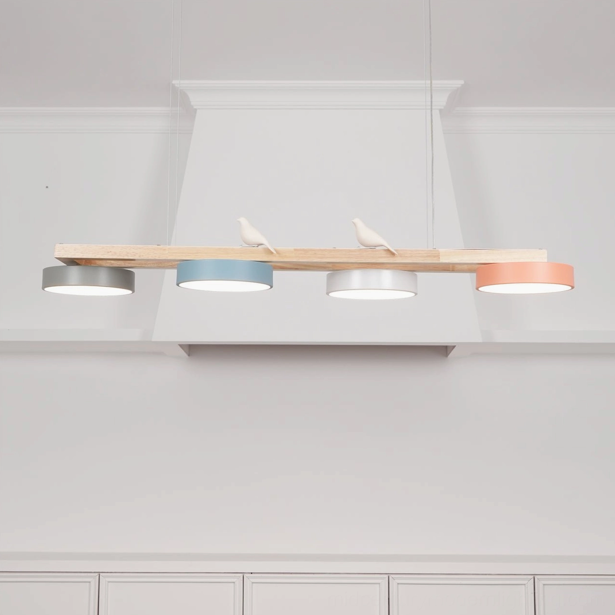 Sienna Bird Linear Chandelier lifestyle photograph in furnished interior environment