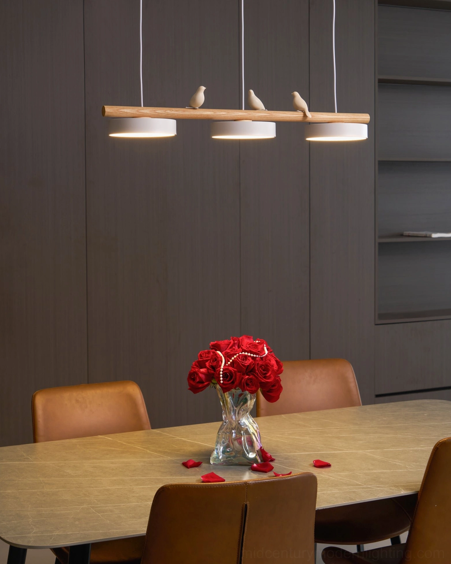 Contemporary bird pendant lamp displaying adjustable ornament arrangement options