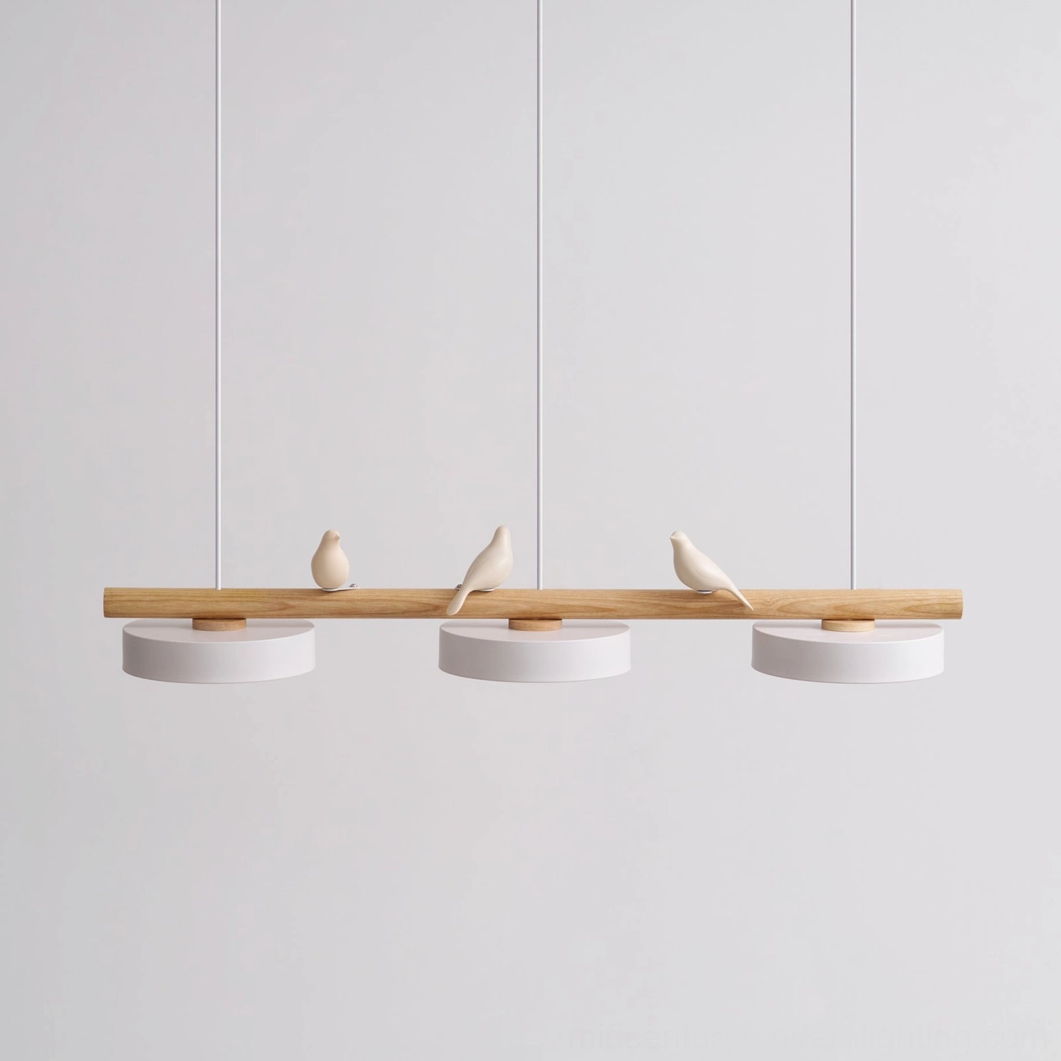 Linear pendant lamp with bird sculptures in contemporary home dining space