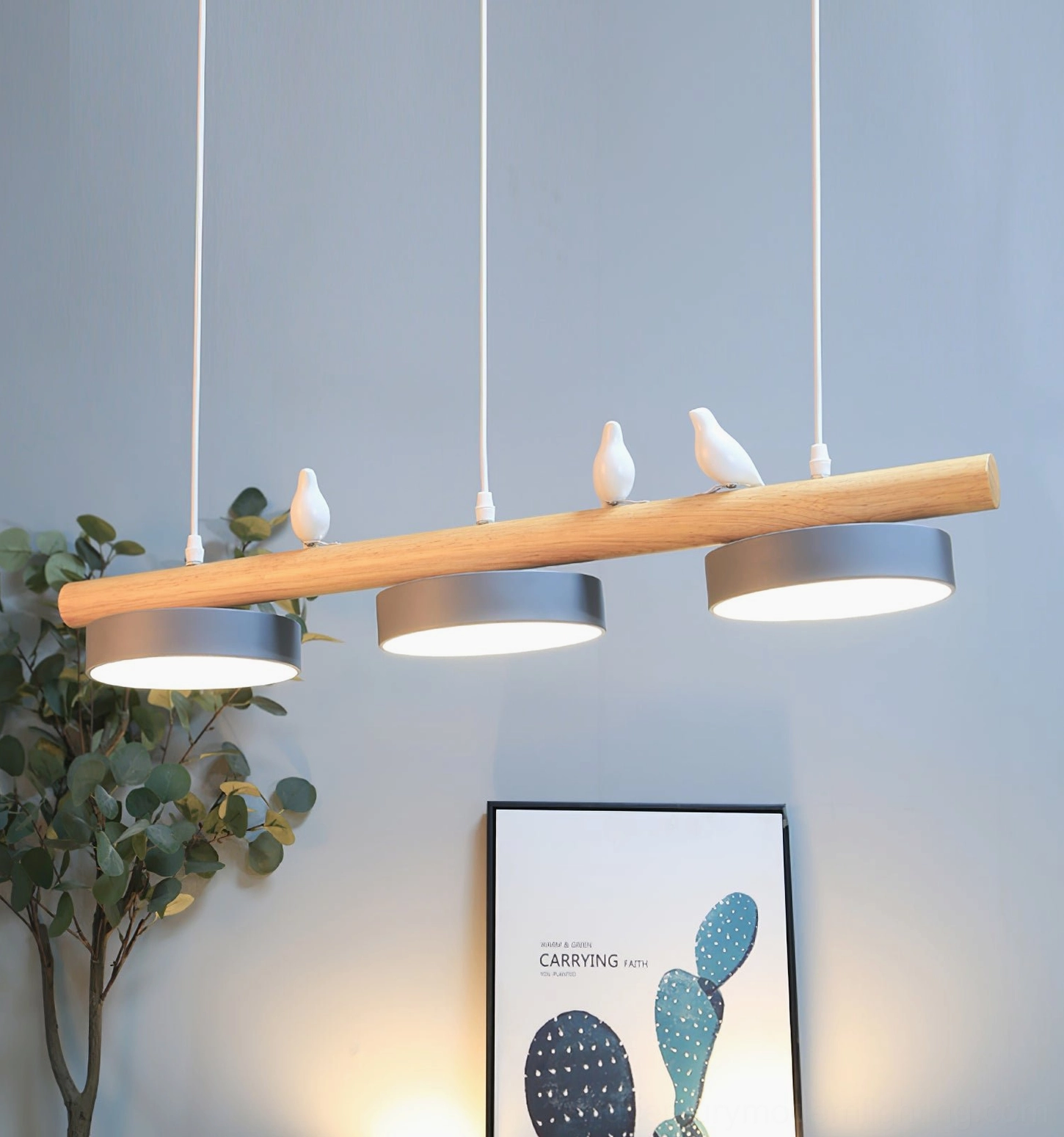 Modern resin bird pendant fixture displaying sculptural form and design detail