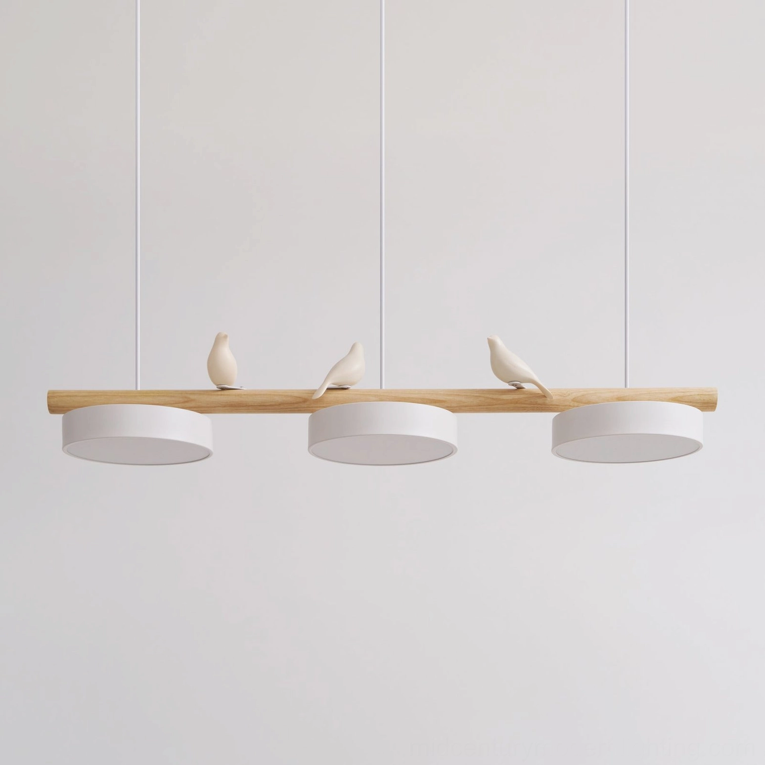 Sienna bird pendant lamp installed in modern home interior above dining surface