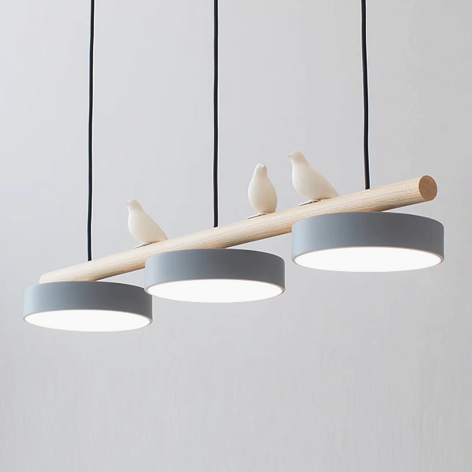Adjustable bird pendant lamp fixture in contemporary interior room space