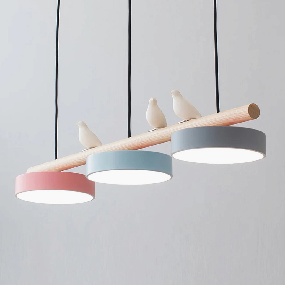 Mid-century modern bird pendant fixture in warm interior lighting application