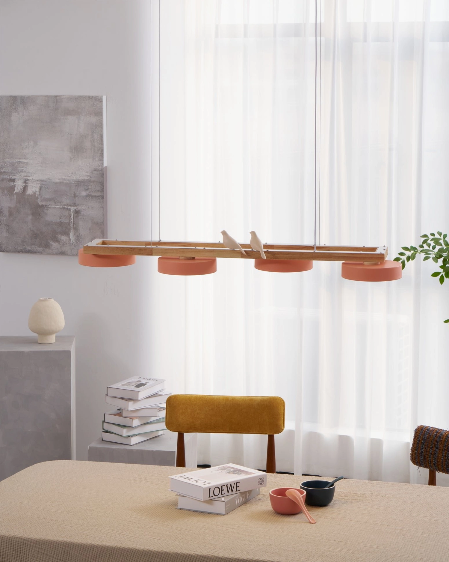 Five-head pink Sienna Bird Chandelier installation in bright contemporary dining room