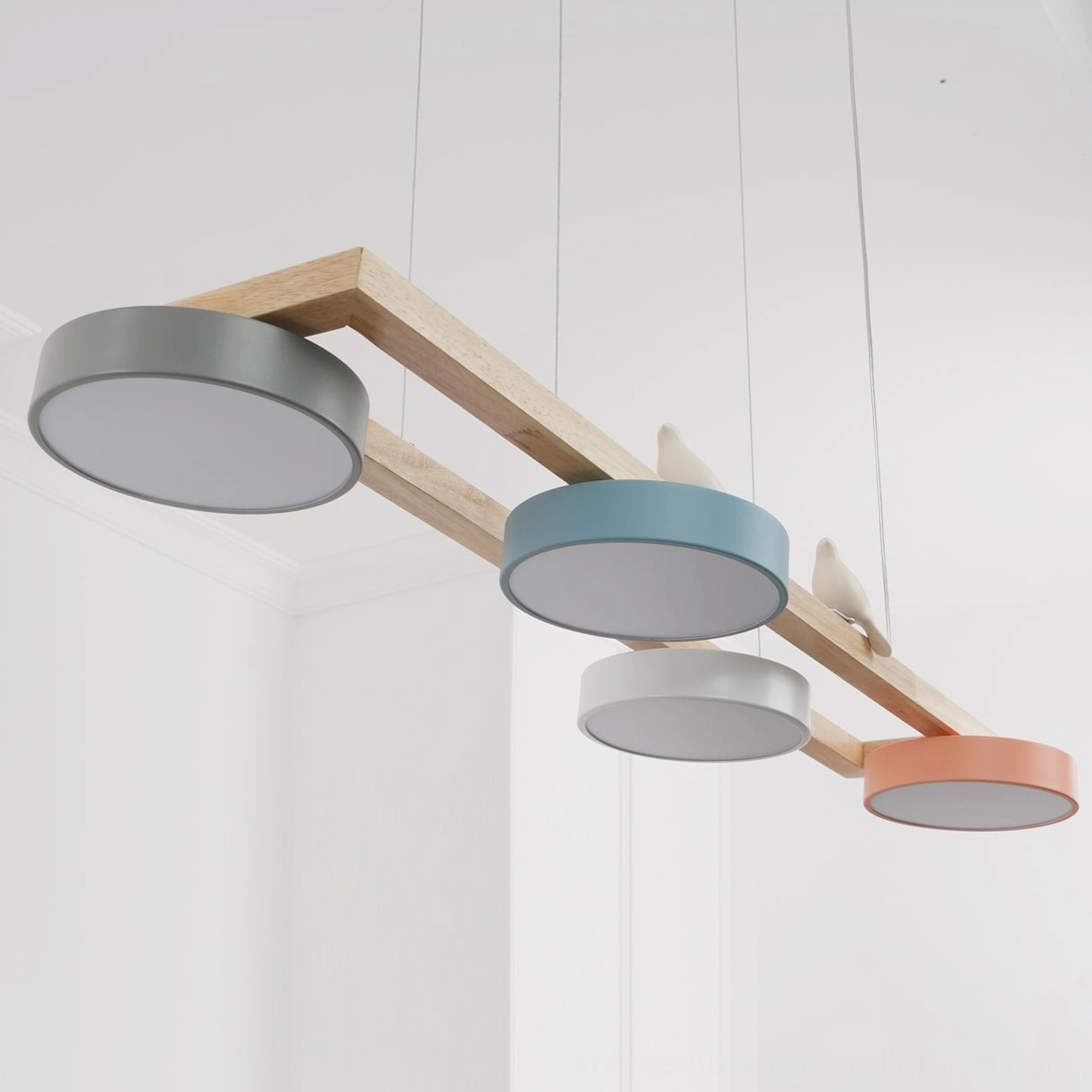Sienna Bird Linear Chandelier interior design application in residential bedroom or dining space
