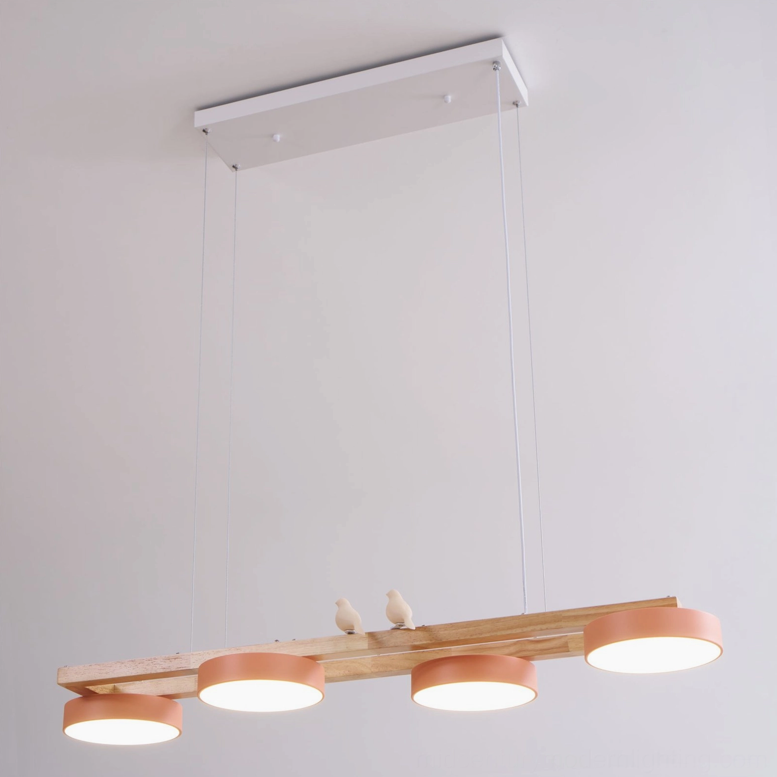 Sienna Bird Linear Chandelier close-up of LED warm white light emission through shades