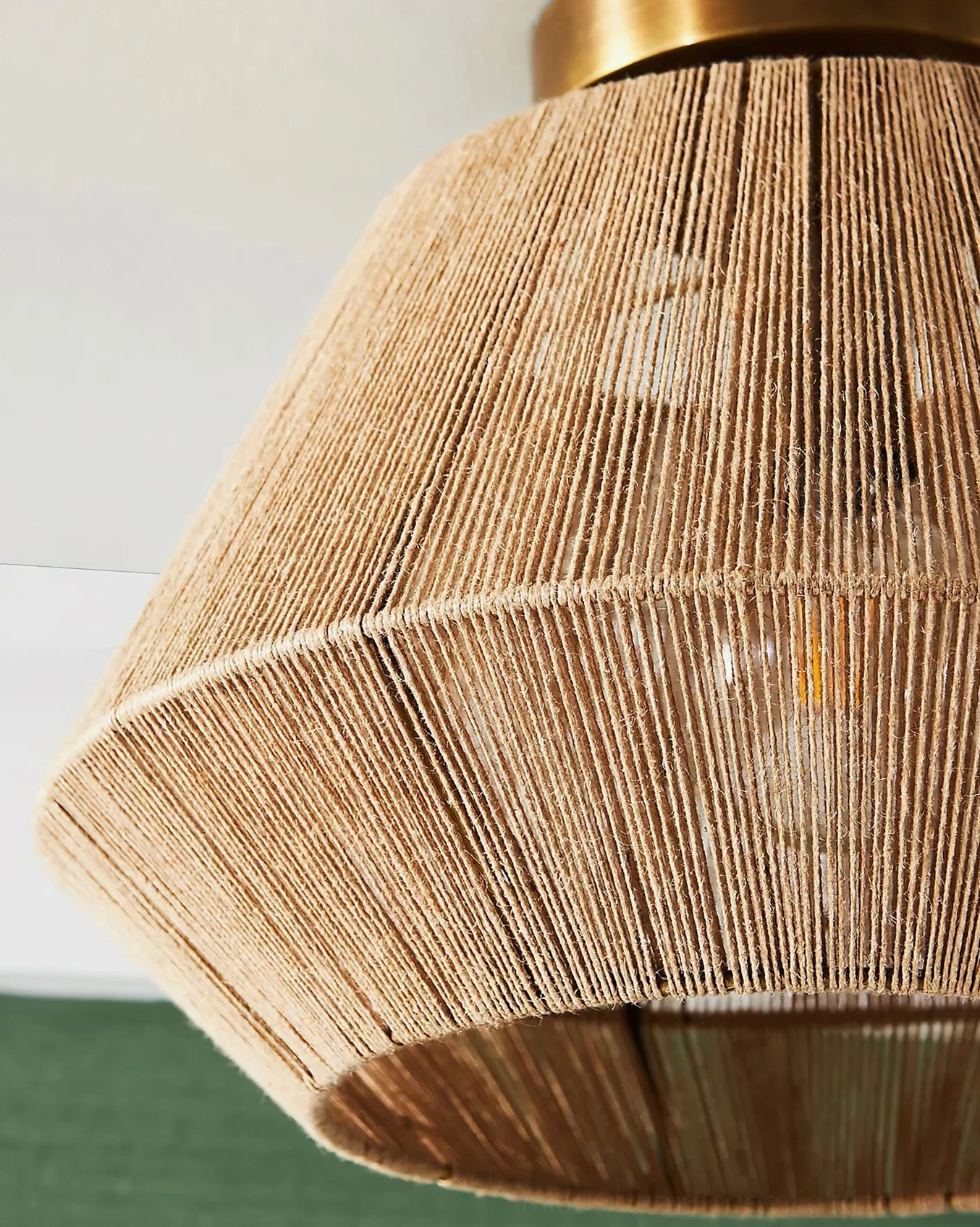 Side close-up of Sierra handwoven rattan shade showing natural fiber craftsmanship