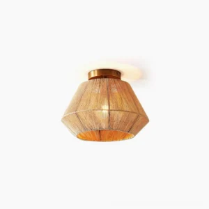 Sierra hand-woven rattan flush mount ceiling light with brass-gold hardware on white background