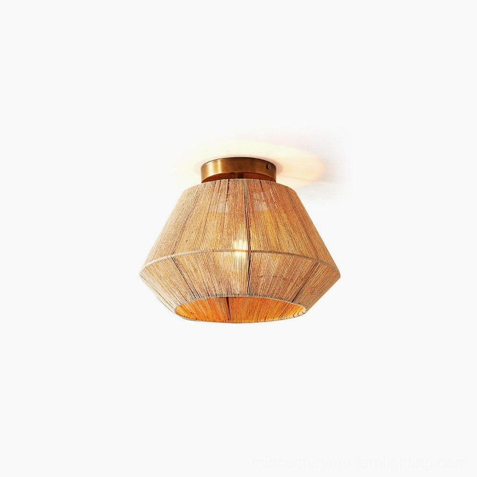 Sierra hand-woven rattan flush mount ceiling light with brass-gold hardware on white background