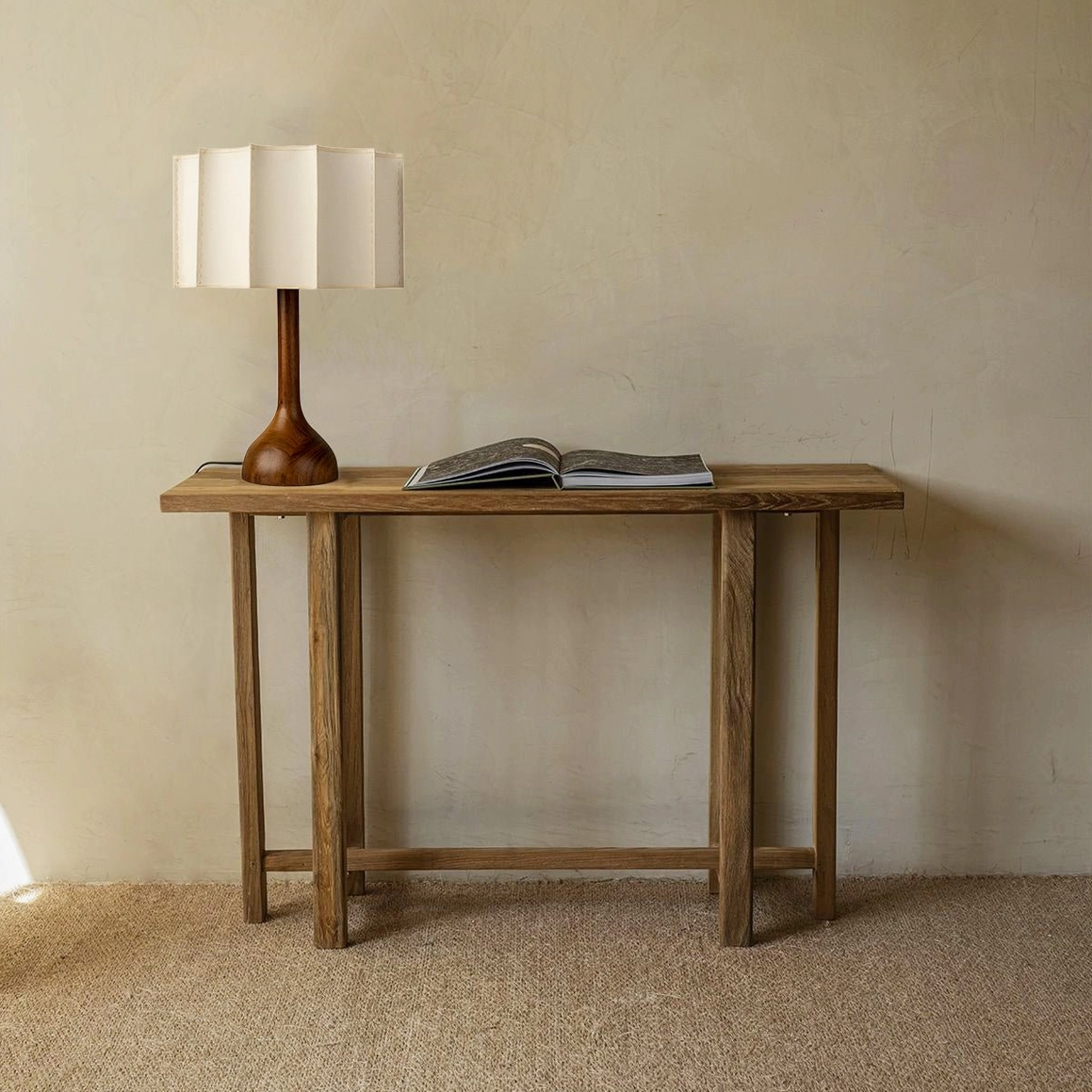 Sierra table lamp with walnut wooden base and beige pleated shade highlighting Scandinavian mid-century design