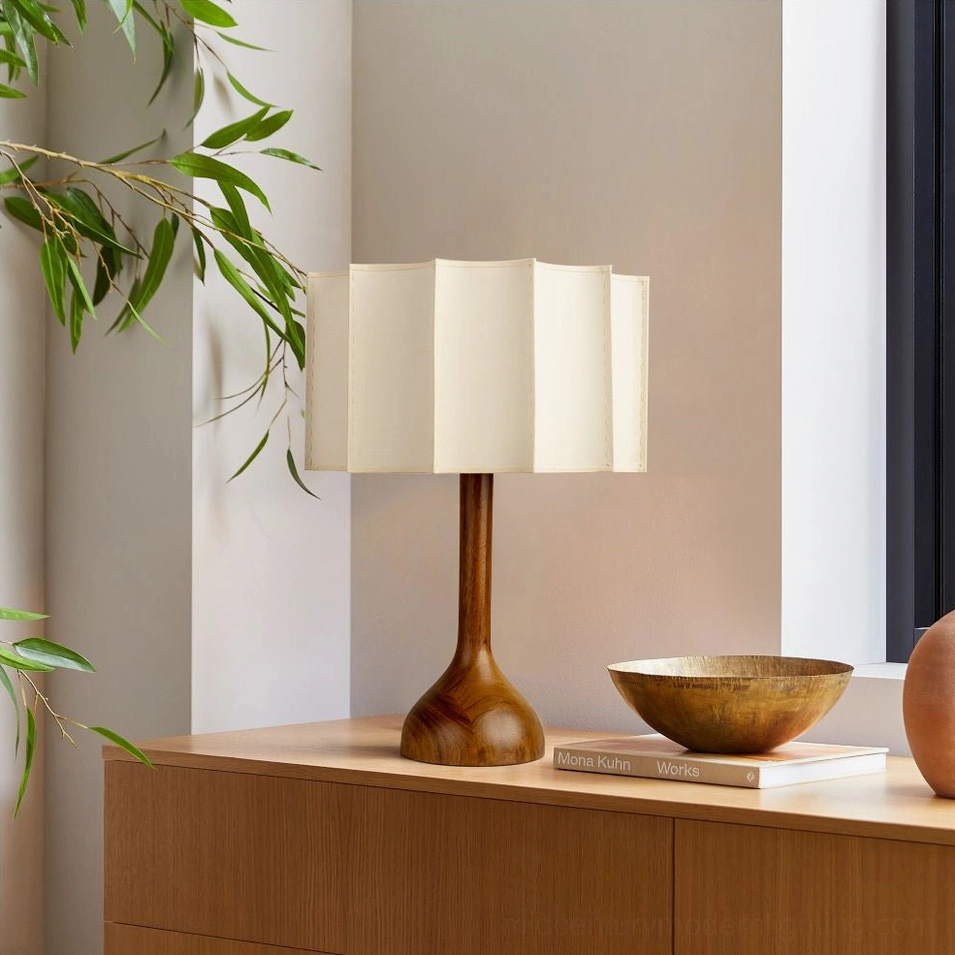 Sierra mid-century modern table lamp on residential entryway console with botanical accents and natural light