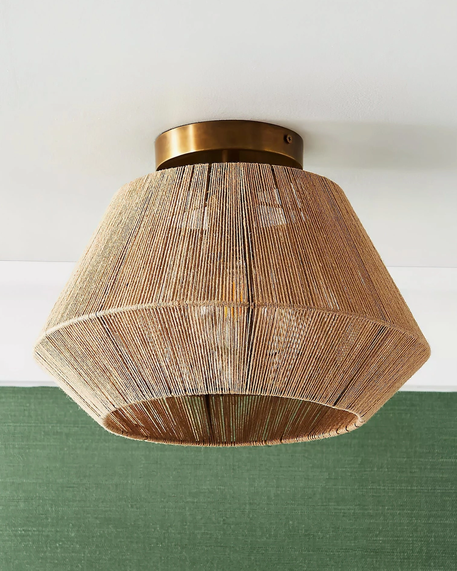 Detailed view of Sierra rattan weave pattern and brass-gold base hardware