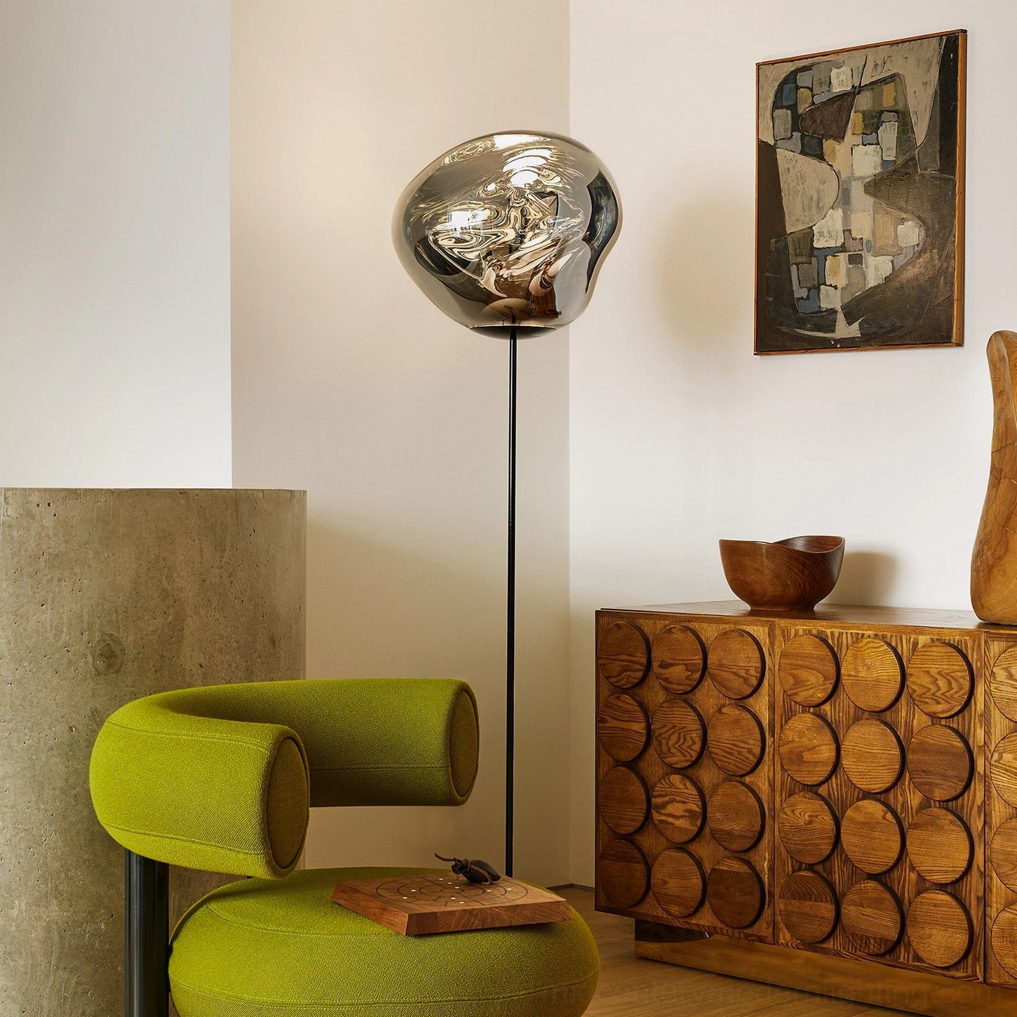 Silver Lava Slim Floor Lamp in cozy living nook with green armchair and wooden cabinet, contemporary floor lighting