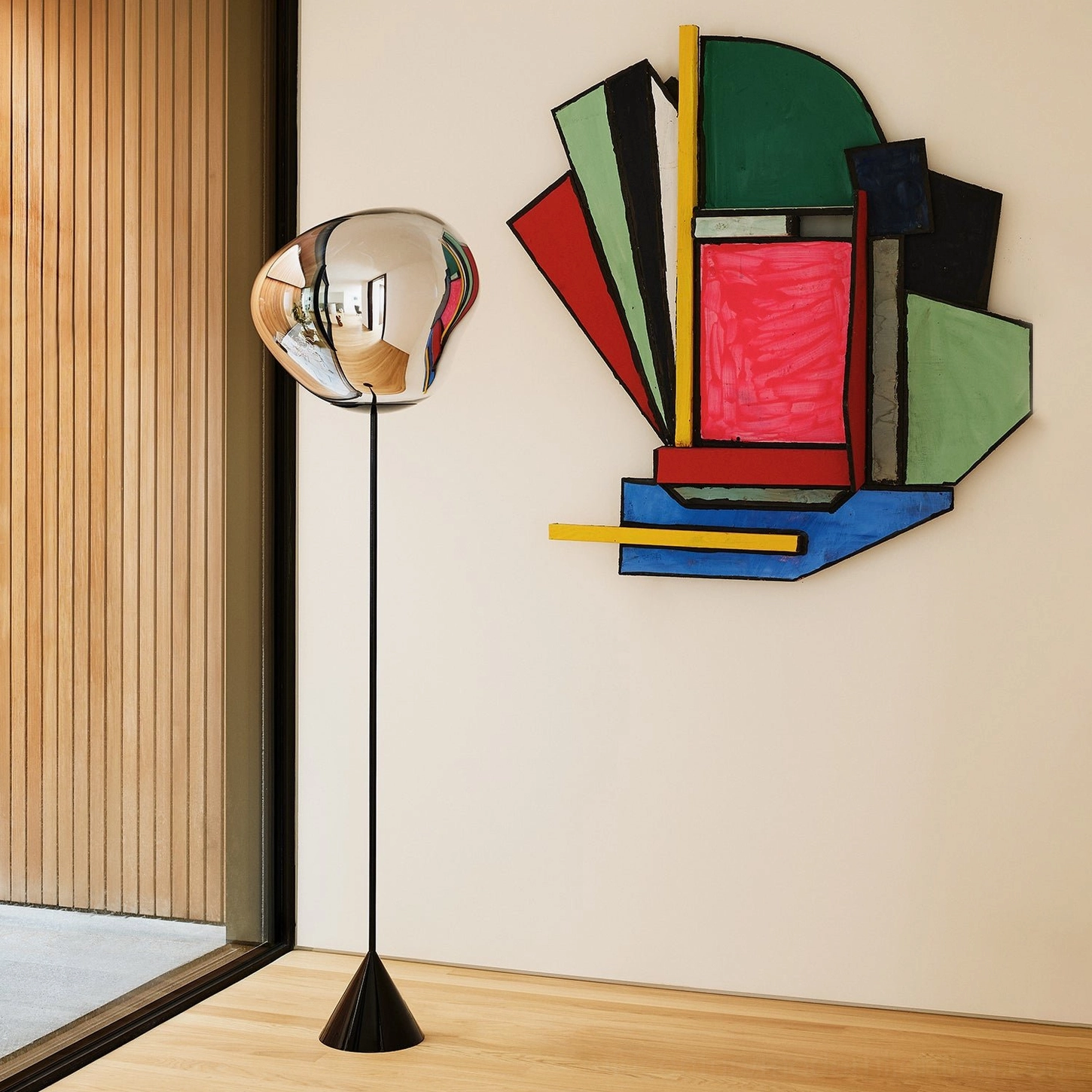 Silver Lava Slim Floor Lamp in modern entryway with geometric abstract wall art, minimalist floor lamp design