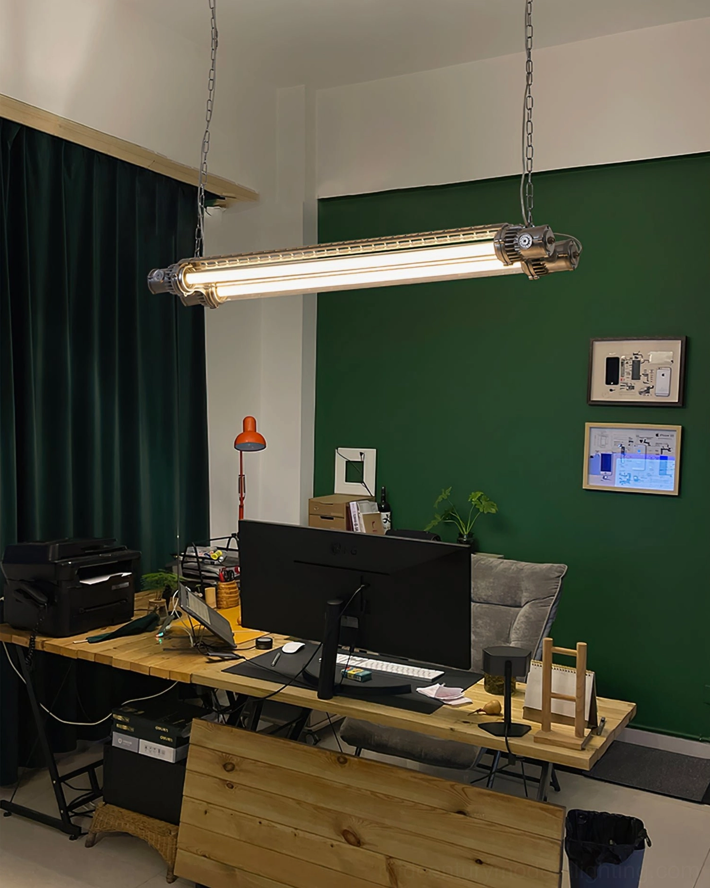 Modern silver tube LED chandelier in minimalist home office workspace, industrial contemporary lighting