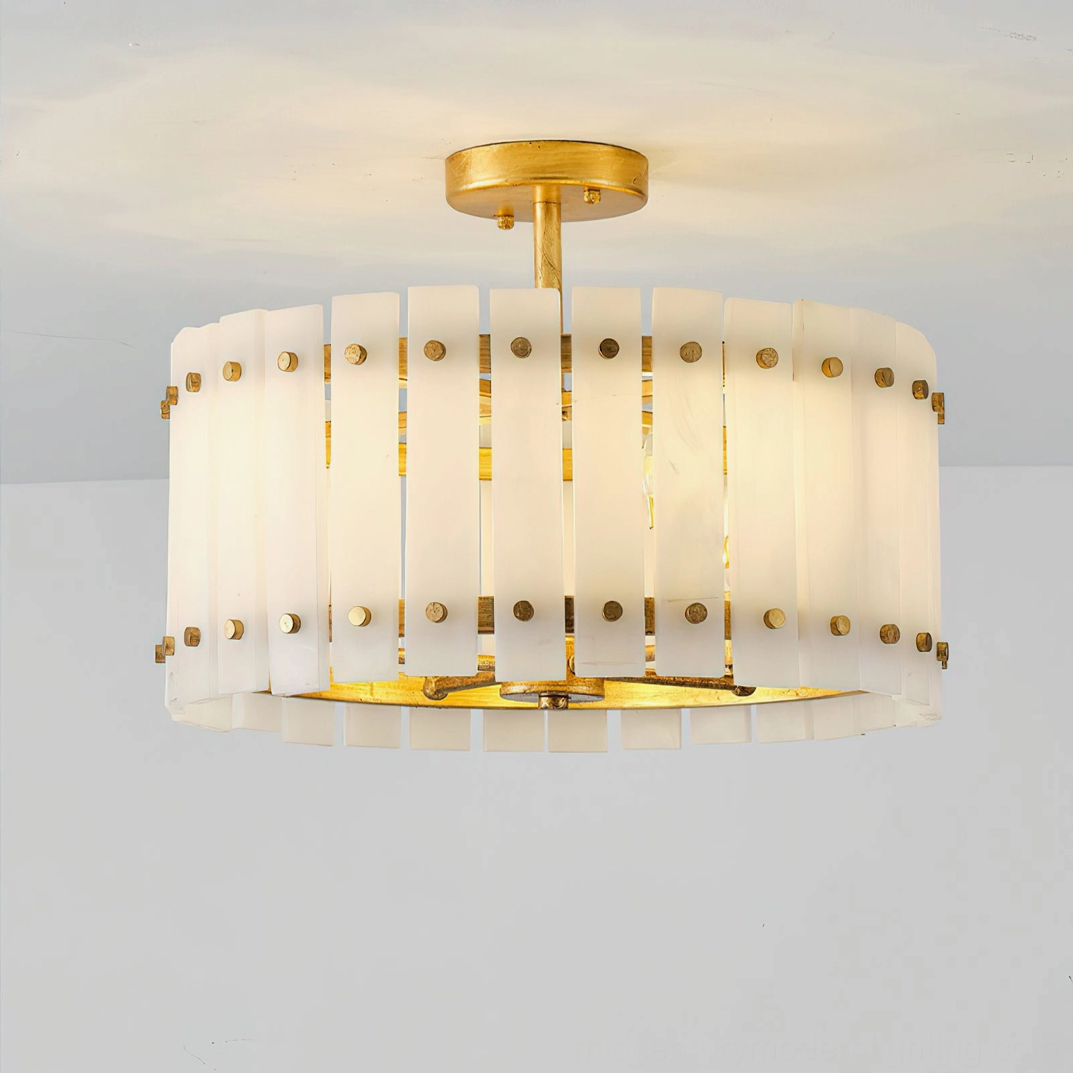 Unlit Sinclair alabaster ceiling light fixture showing exposed brass inner frame and structural design details