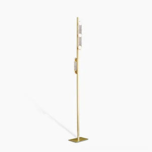 Sinclair polished brass floor lamp with frosted acrylic shade, front view against minimalist white studio background