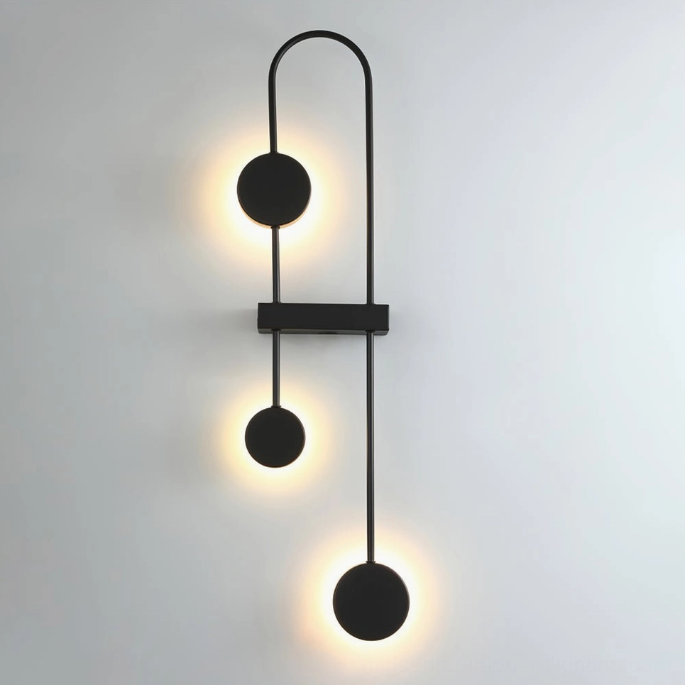 Single molecular wall sconce in matte black or brushed gold with adjustable color temperature