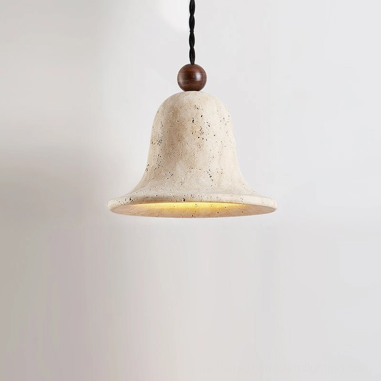 Single travertine bell pendant low-angle view with warm glowing bulb and black twisted cord