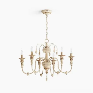 Vintage candelabra chandelier with six ornate carved arms and distressed cream finish, top-down view