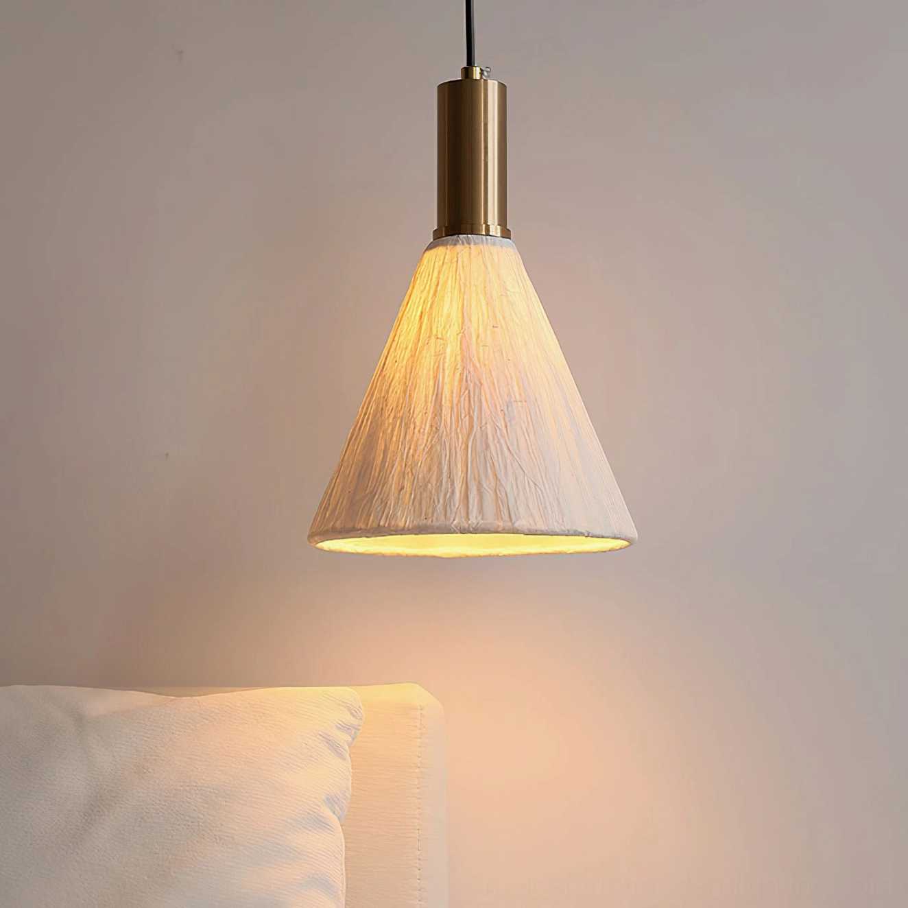 Siya pendant light above console table with decorative items, boho home styling and warm ambiance