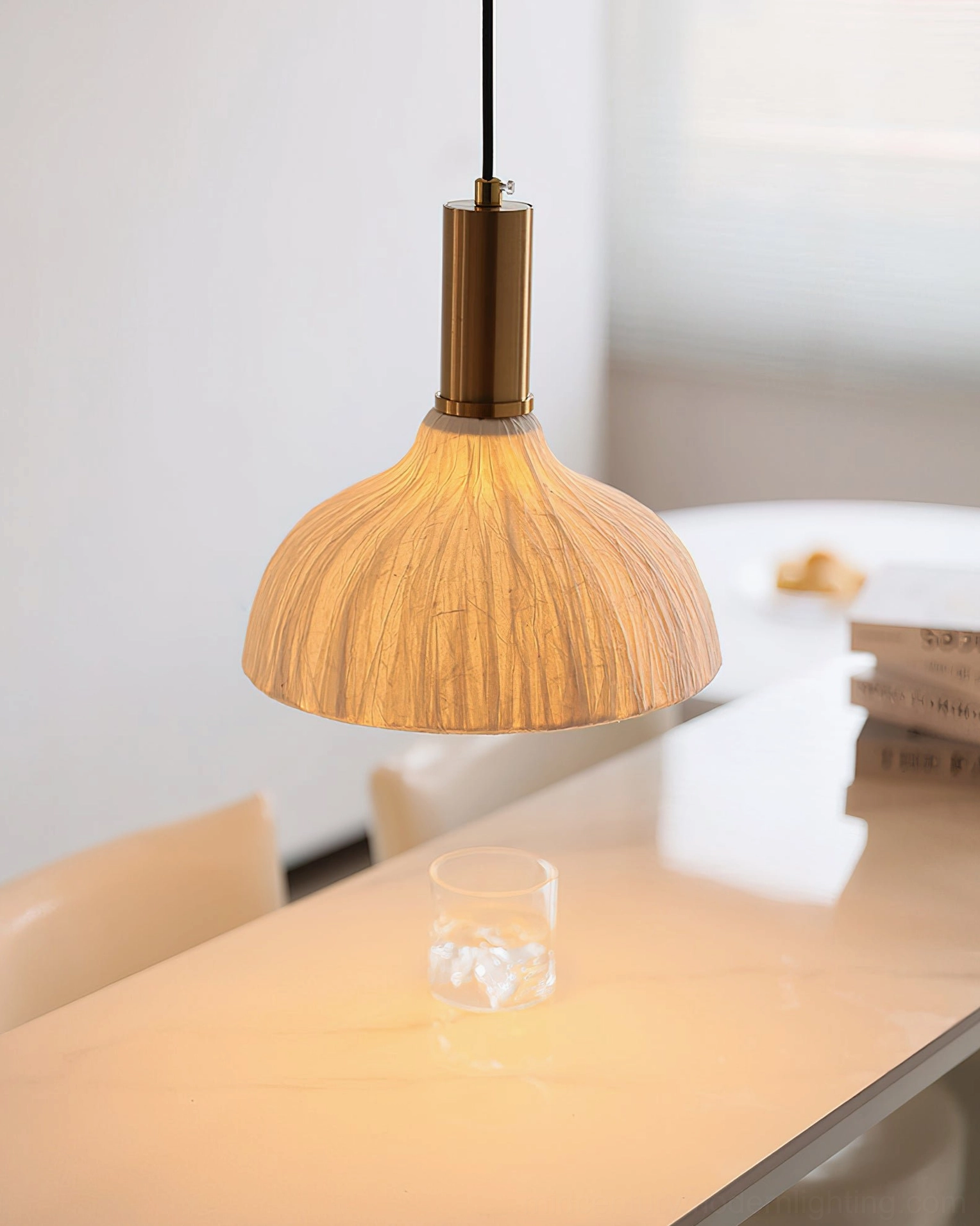 Close-up texture detail of Siya hand-crafted crinkled paper shade, artisanal boho lighting craftsmanship