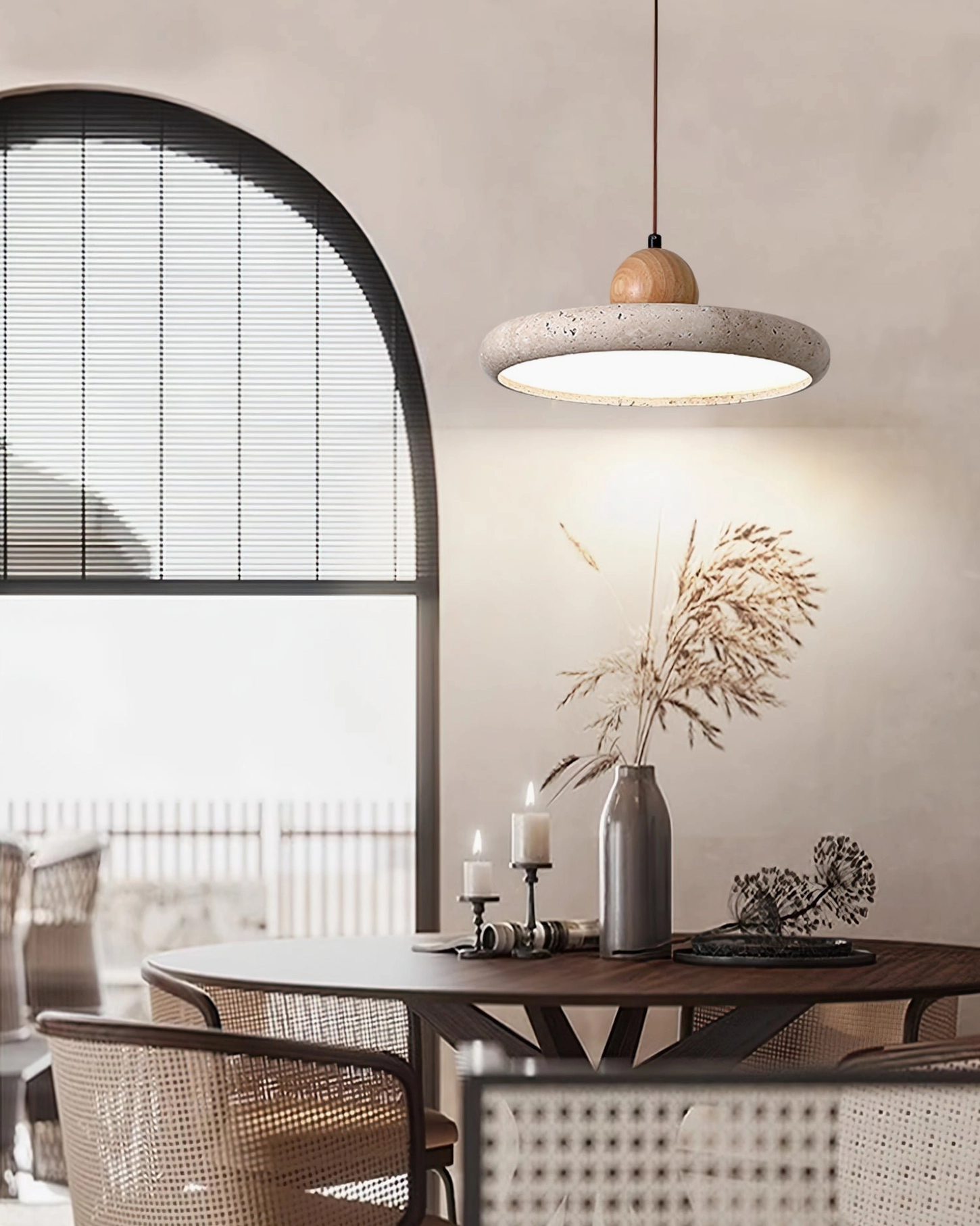 Siyane travertine pendant light suspended in contemporary home interior with minimalist decor