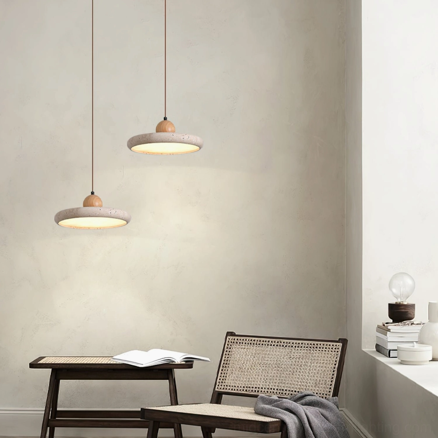 Close-up of Siyane travertine pendant showing warm beige color option and natural stone characteristics