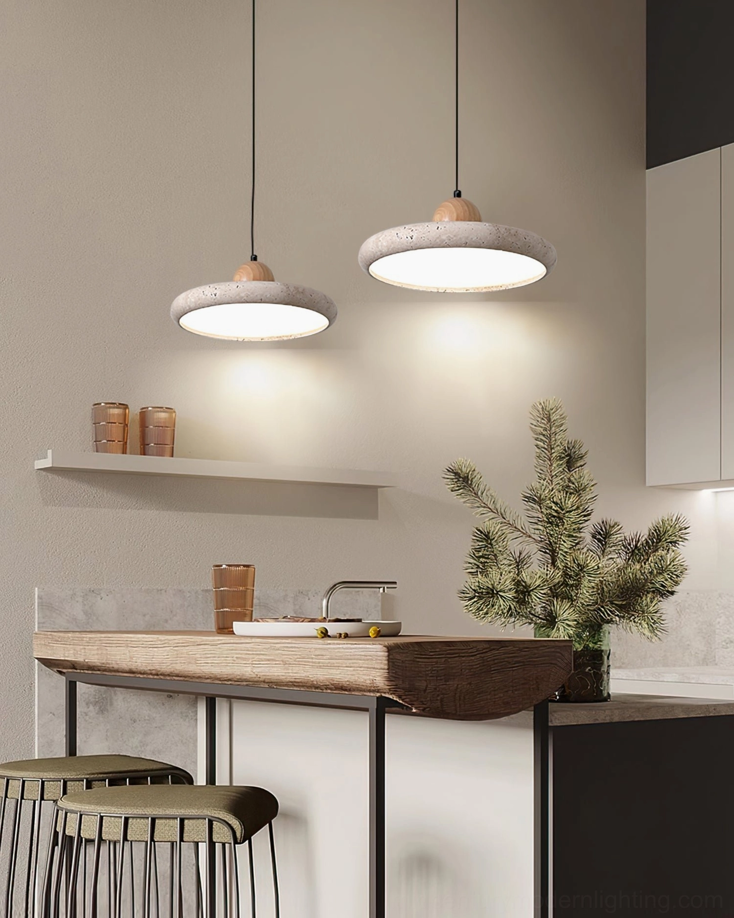 Siyane pendant light warm glow illuminating modern minimalist living space with natural materials