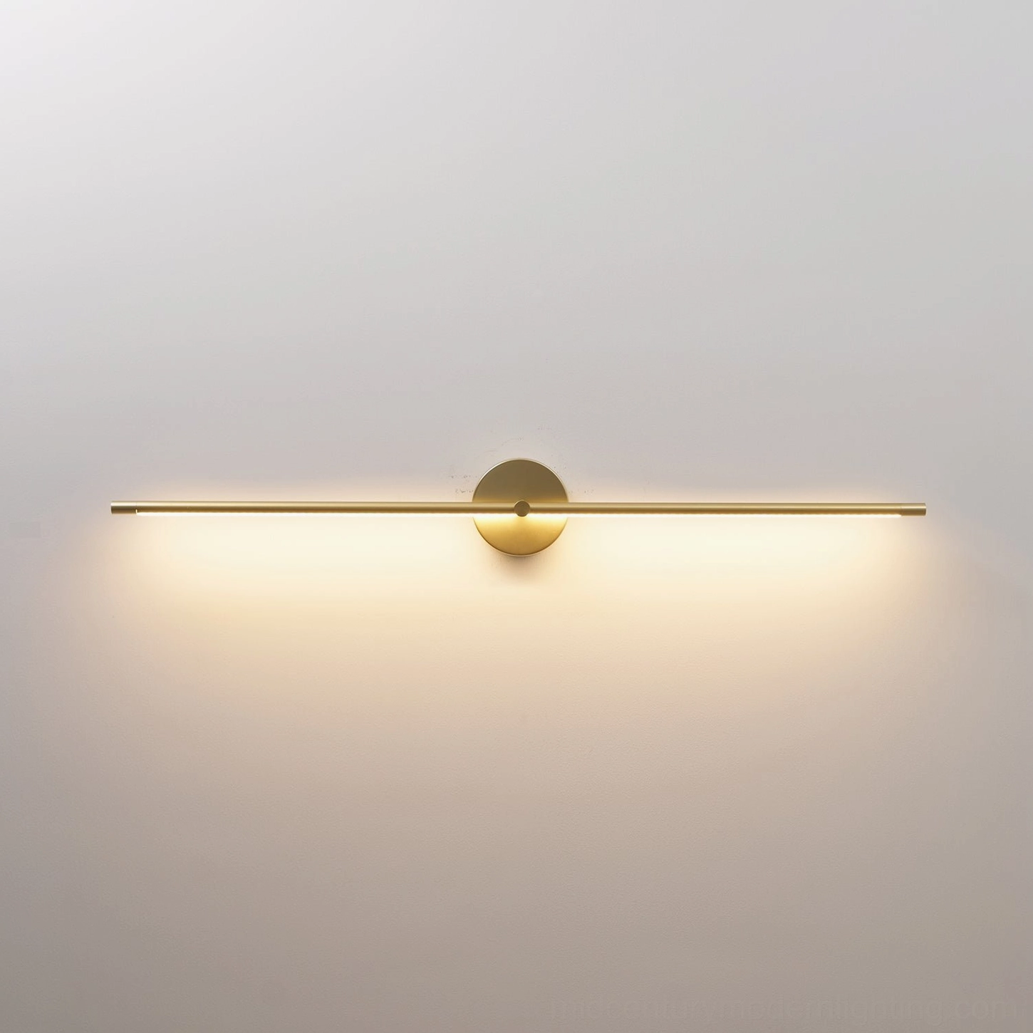Sleek linear wall lamp casting soft even glow in minimalist interior