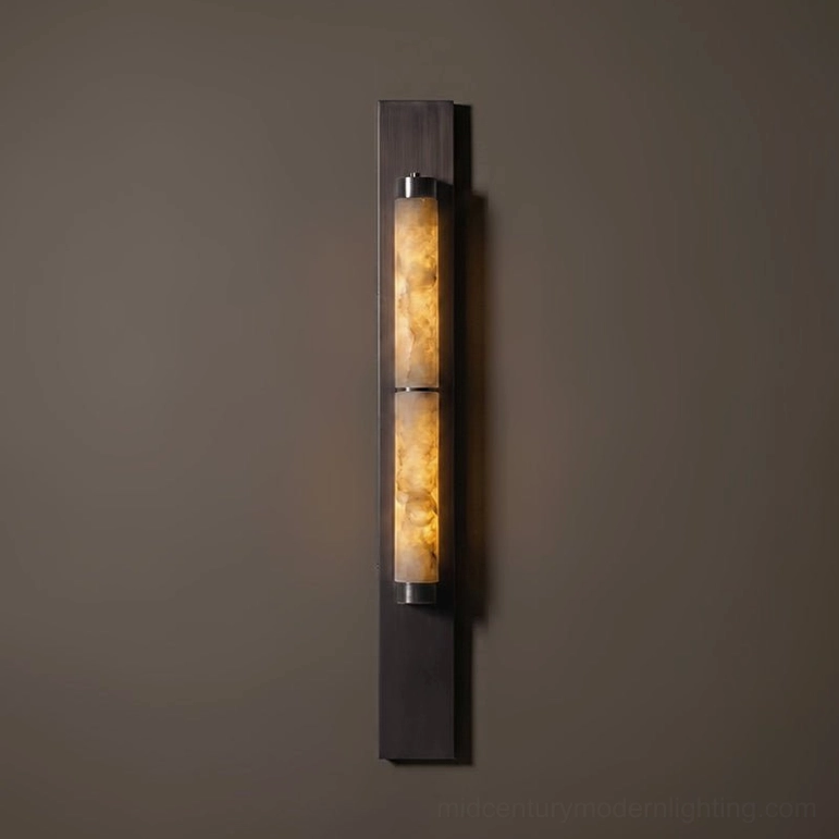 Small alabaster wall lamp bronze finish warm light compact model product photography