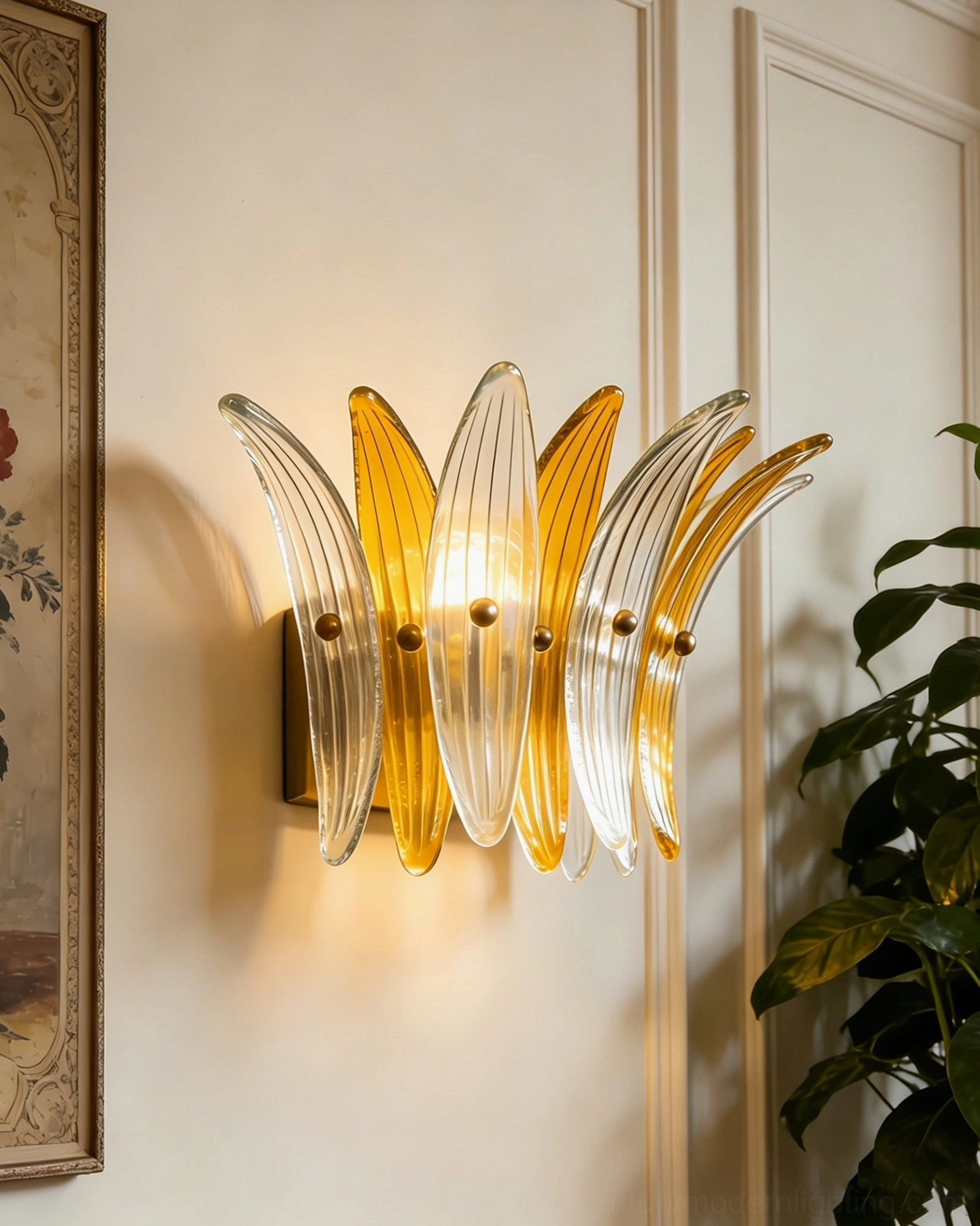 Dual-tone clear and amber fluted Smeralda sconce with illuminated petal design and brass mounting
