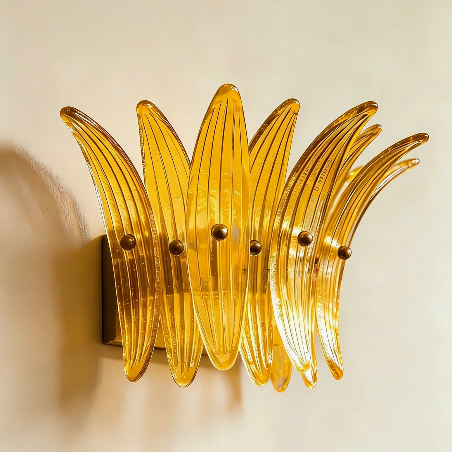Smeralda wall sconce illuminated display showing glass plume texture and light diffusion