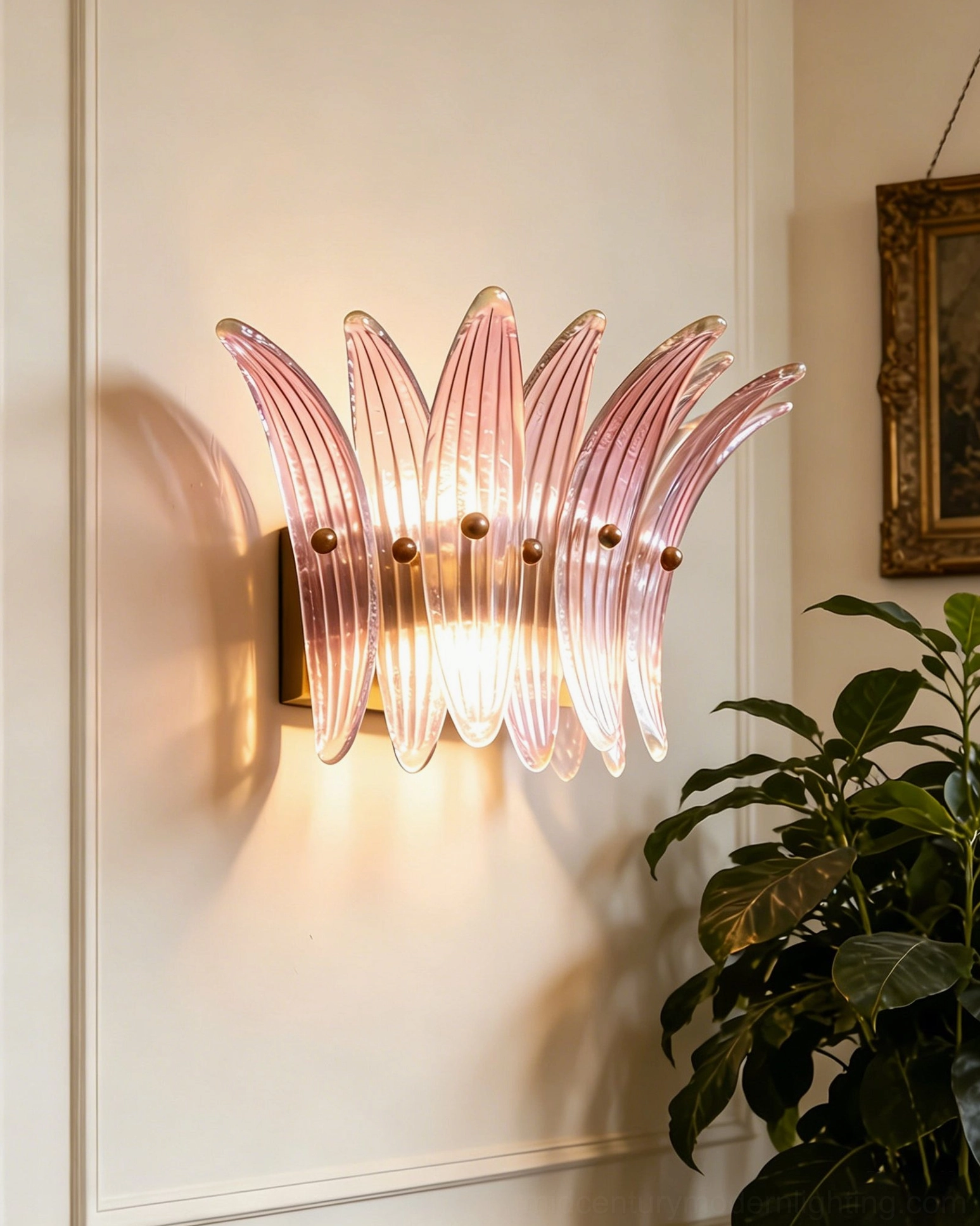 Pink gradient fluted glass Smeralda wall sconce with warm light on paneled wall background
