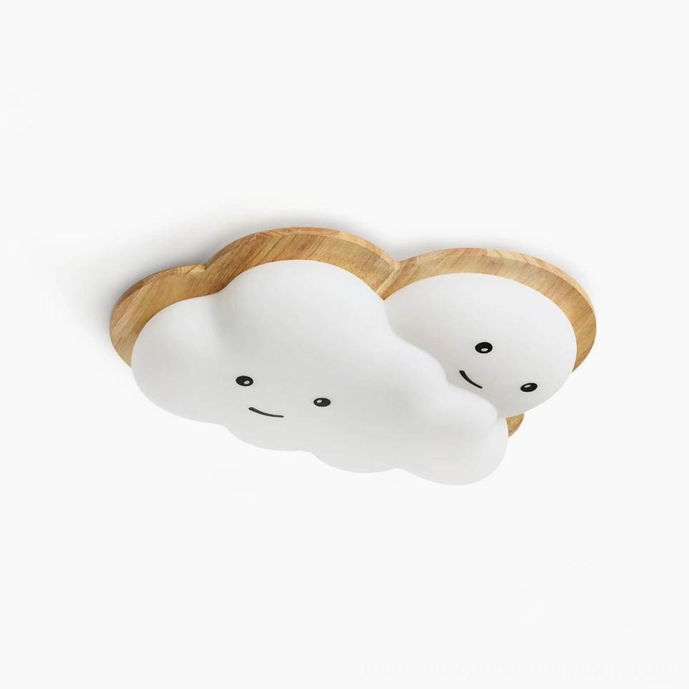 Smiling cloud ceiling lamp front view with cute face design, white acrylic shade with natural wood trim on studio background