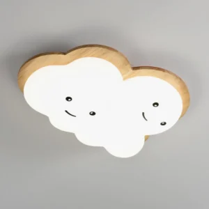 Top-down view of smiling cloud ceiling light with warm LED glow and cheerful cartoon face details