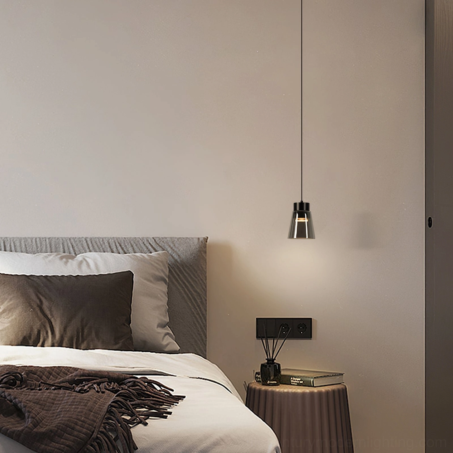 Single tapered smoke grey pendant light above bedroom bedside, warm ambient lighting
