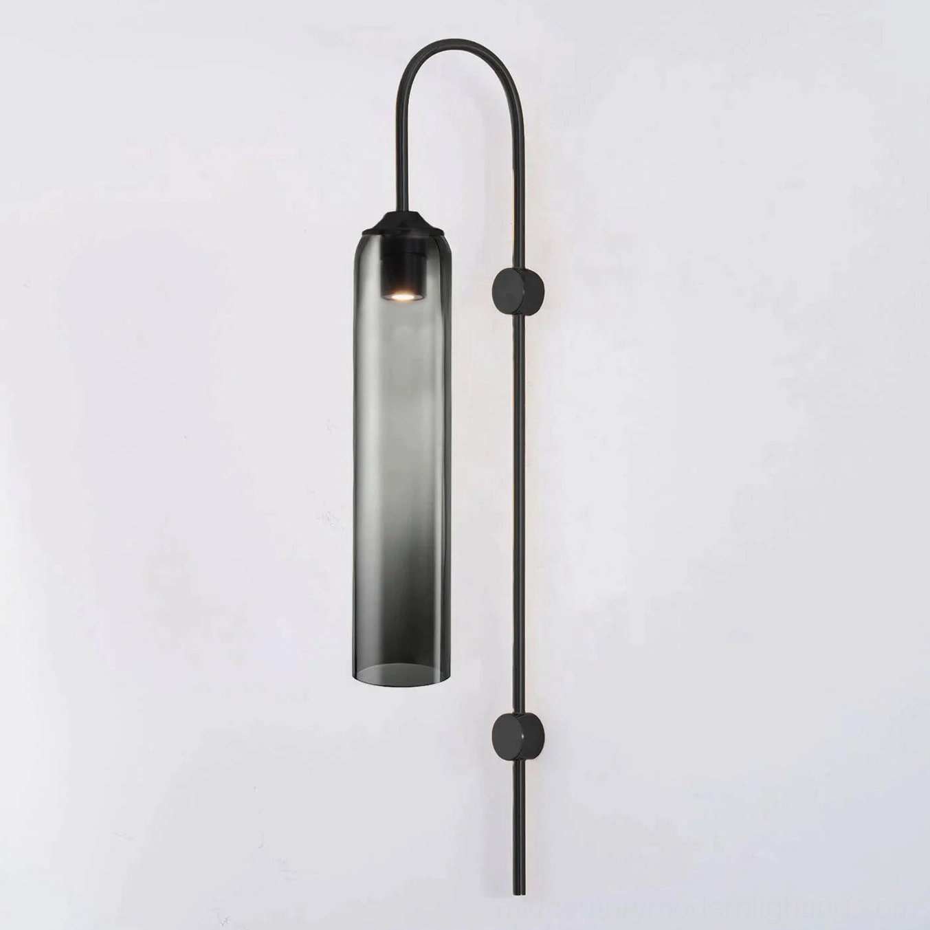 Smoke grey glass wall sconce in contemporary industrial loft interior with modern lounge furniture