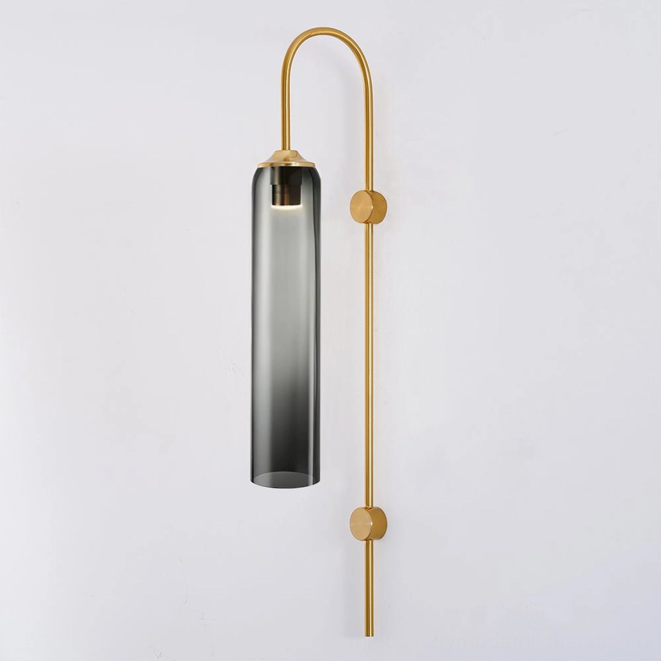 Smoke grey glass wall sconce showing sophisticated moody tone and light diffusion properties