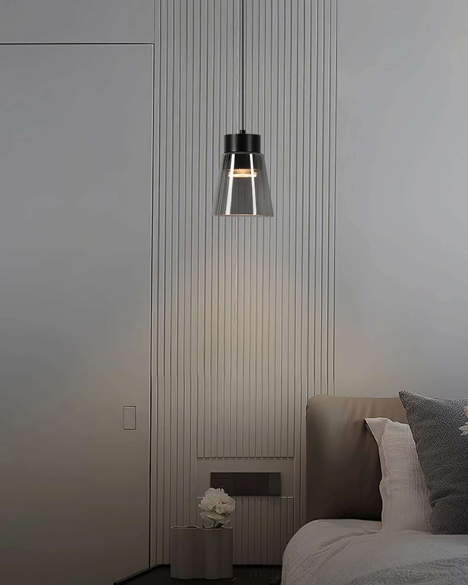 Black metal smoke grey cone pendant lamp providing soft ambient lighting in bedroom