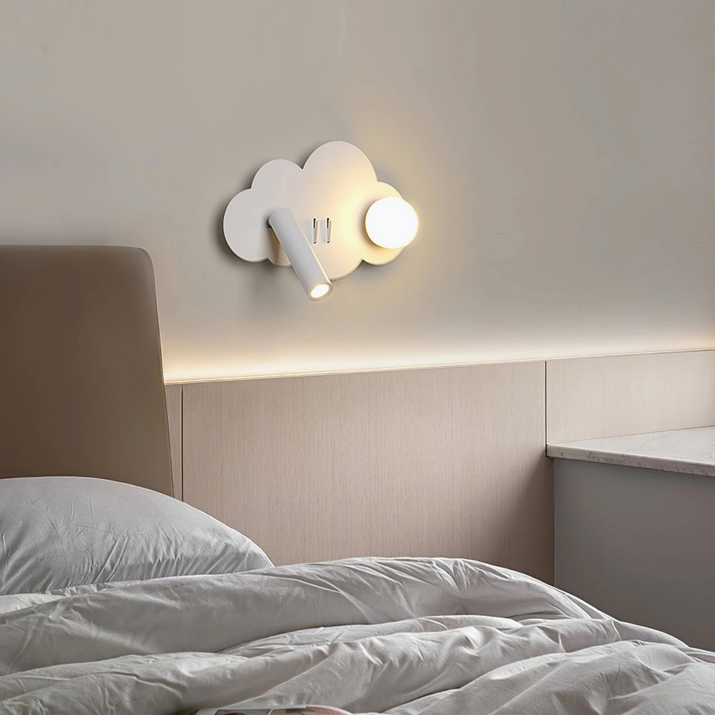 Snotra cloud-shaped wall lamp in modern bedroom with paneled wall and warm ambient lighting