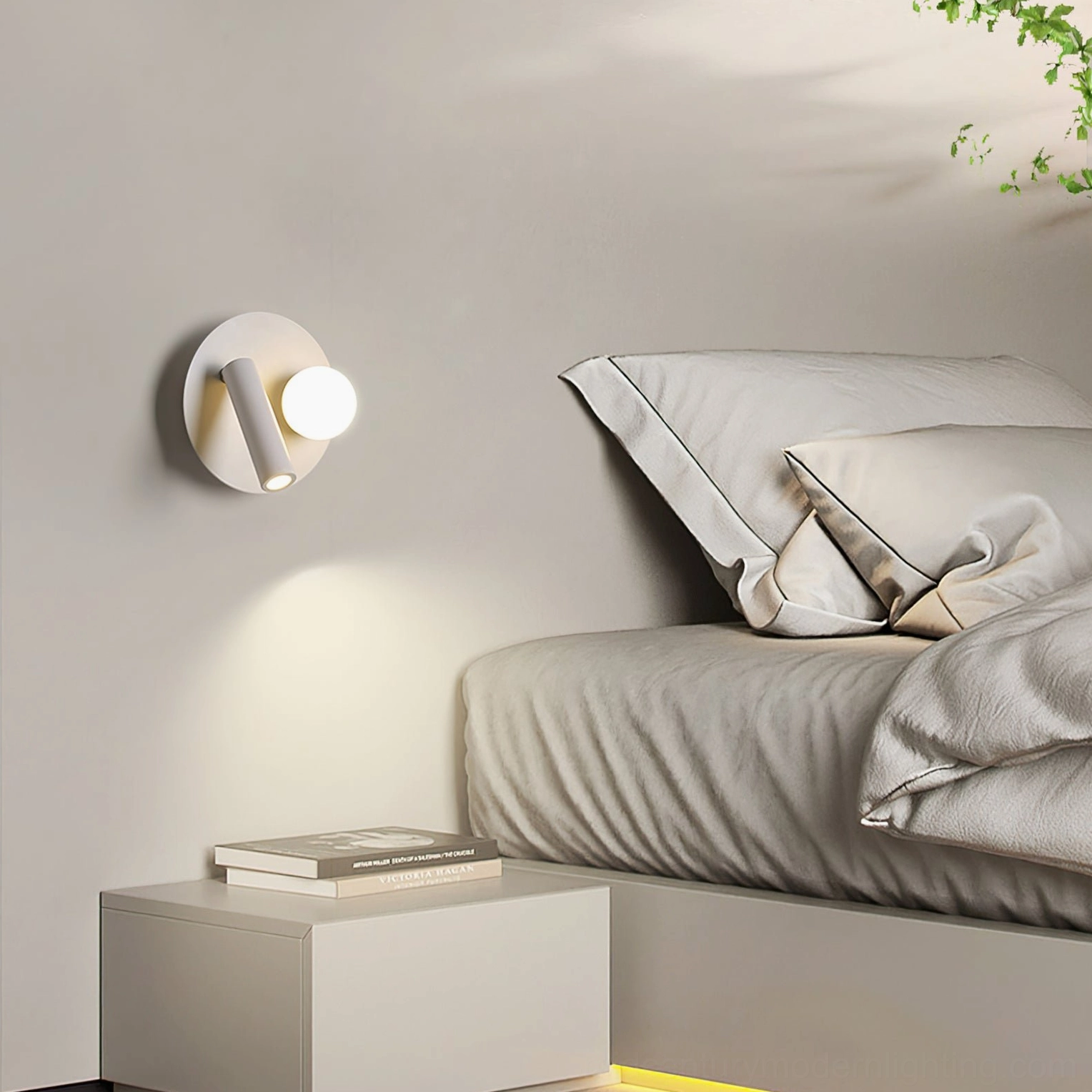 Snotra compact single-head wall lamp providing warm accent lighting in modern bedroom