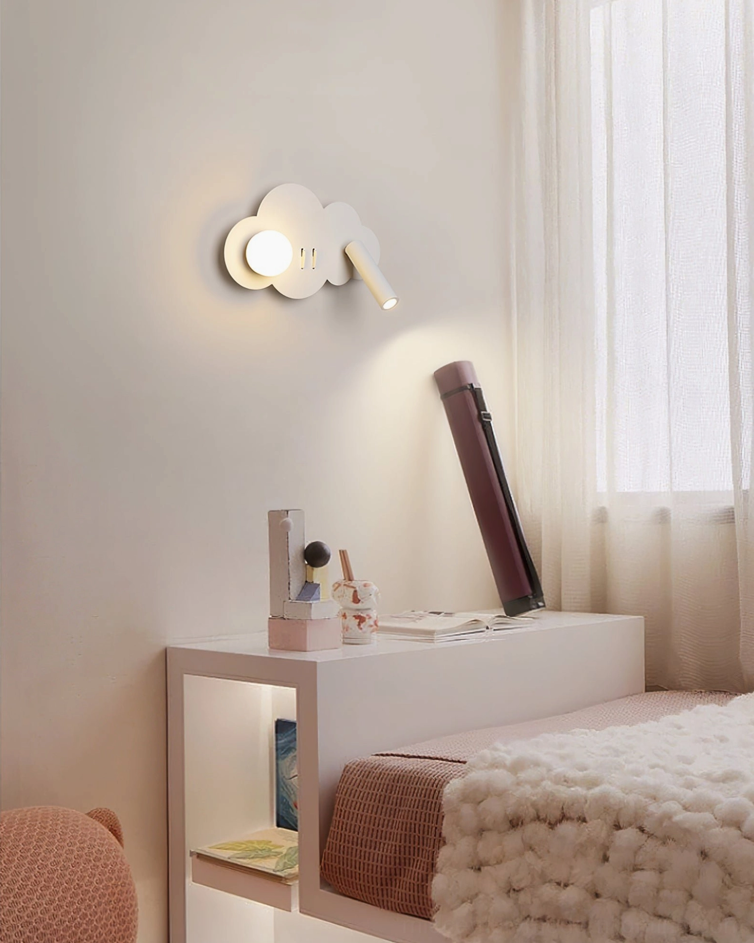 Snotra wall lamp illuminated showing warm white LED light distribution and fixture profile