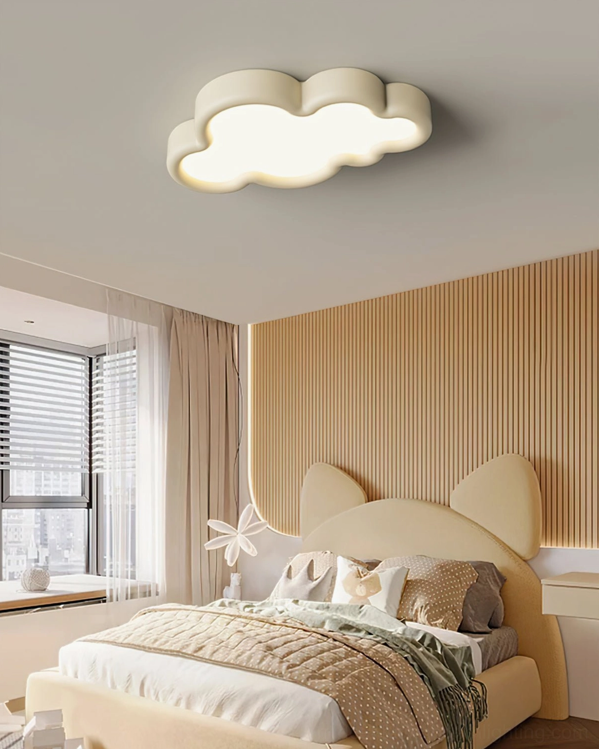 Cloud ceiling lamp in creamy white finish above bed in modern minimalist bedroom