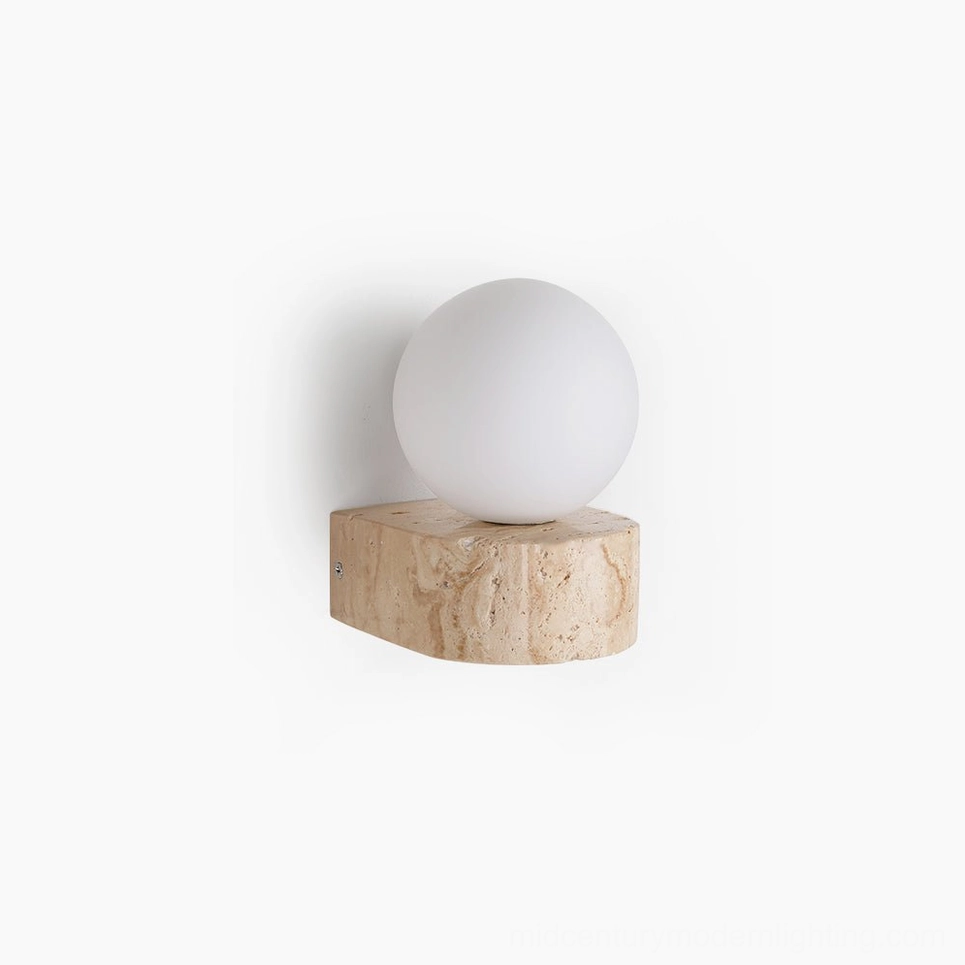 Solace travertine wall sconce with frosted glass globe - minimalist studio product view