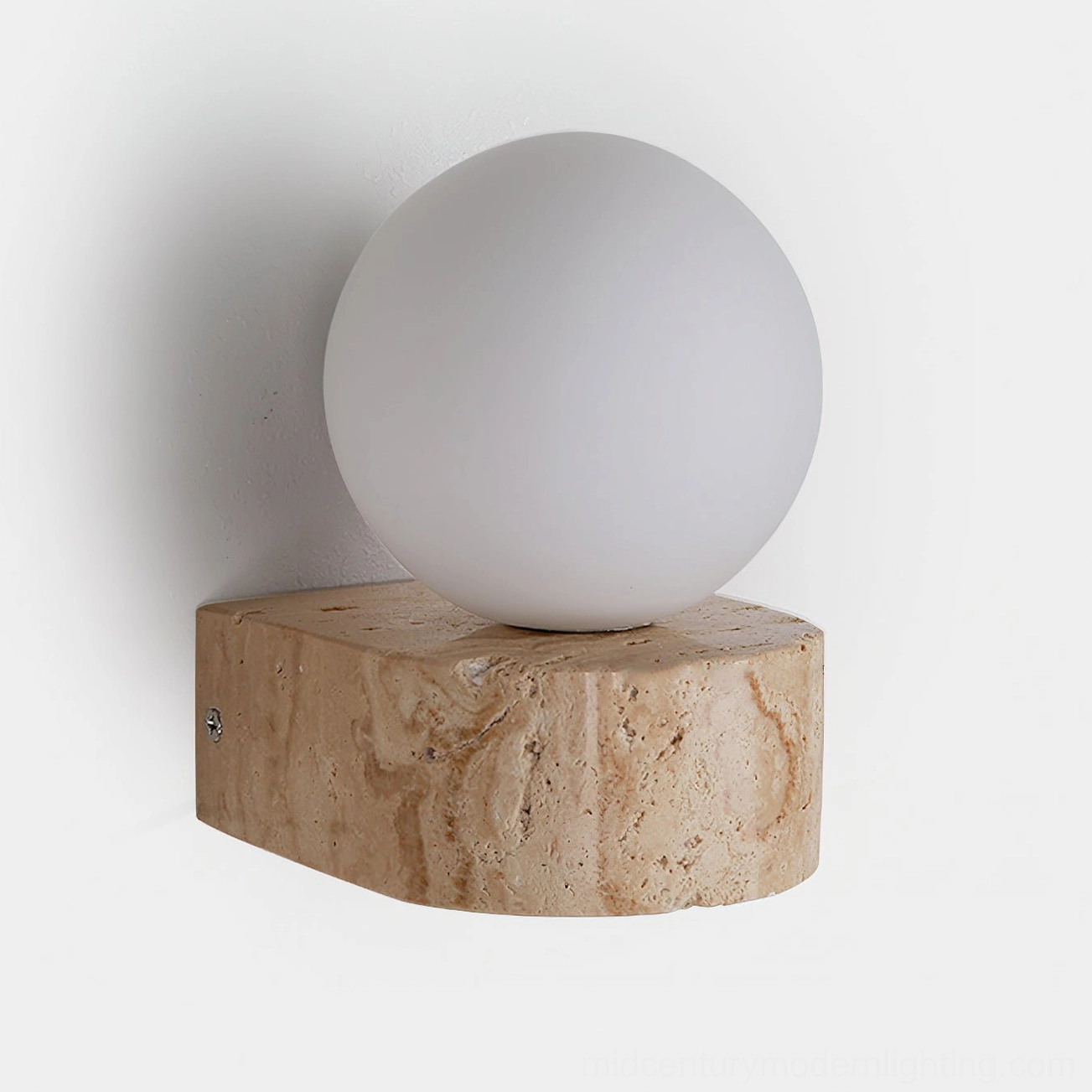 Unlit solace travertine wall sconce front view showing matte glass globe and mounting