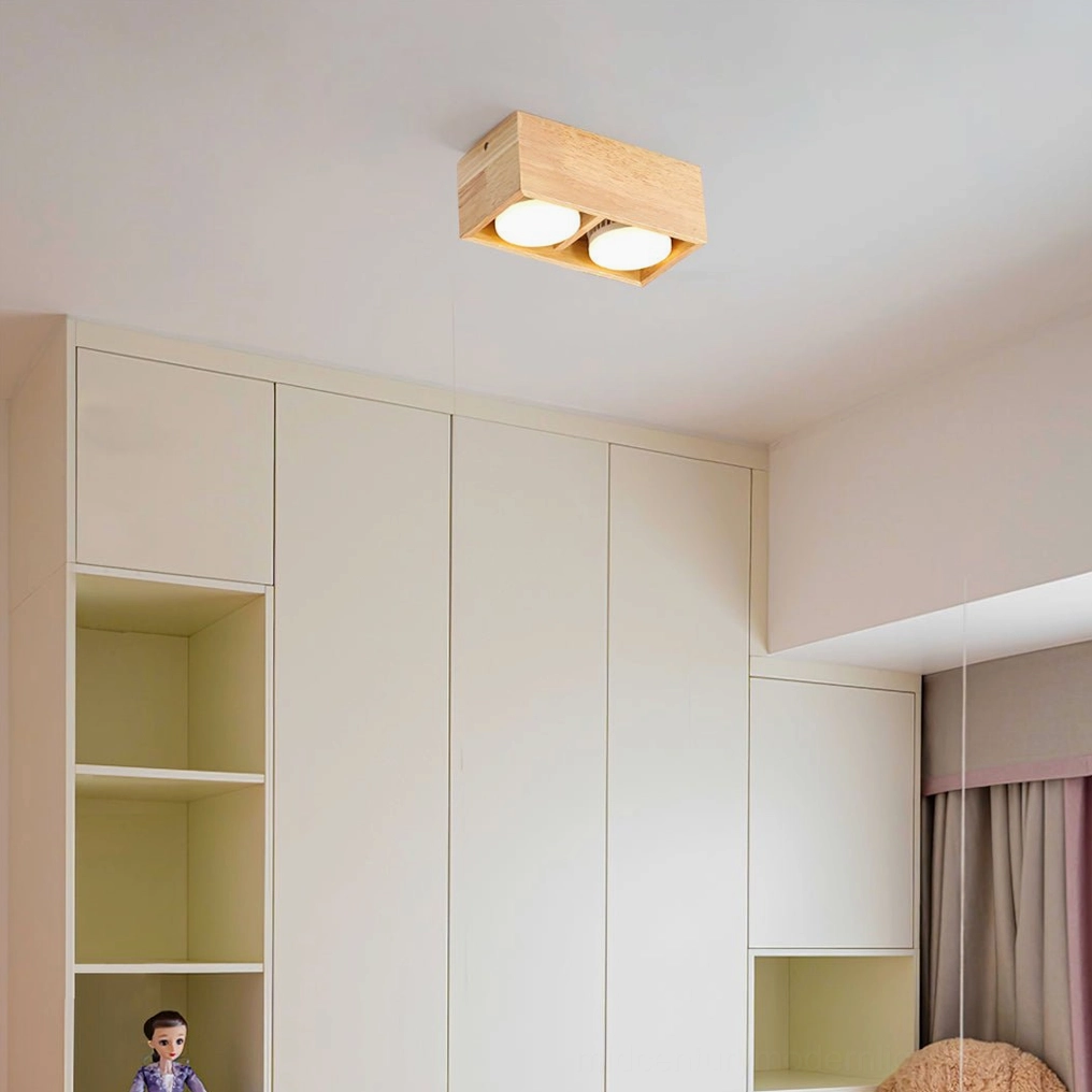 Solid wood ceiling lamp with acrylic diffuser installed in warm interior space, ambient lighting demonstration