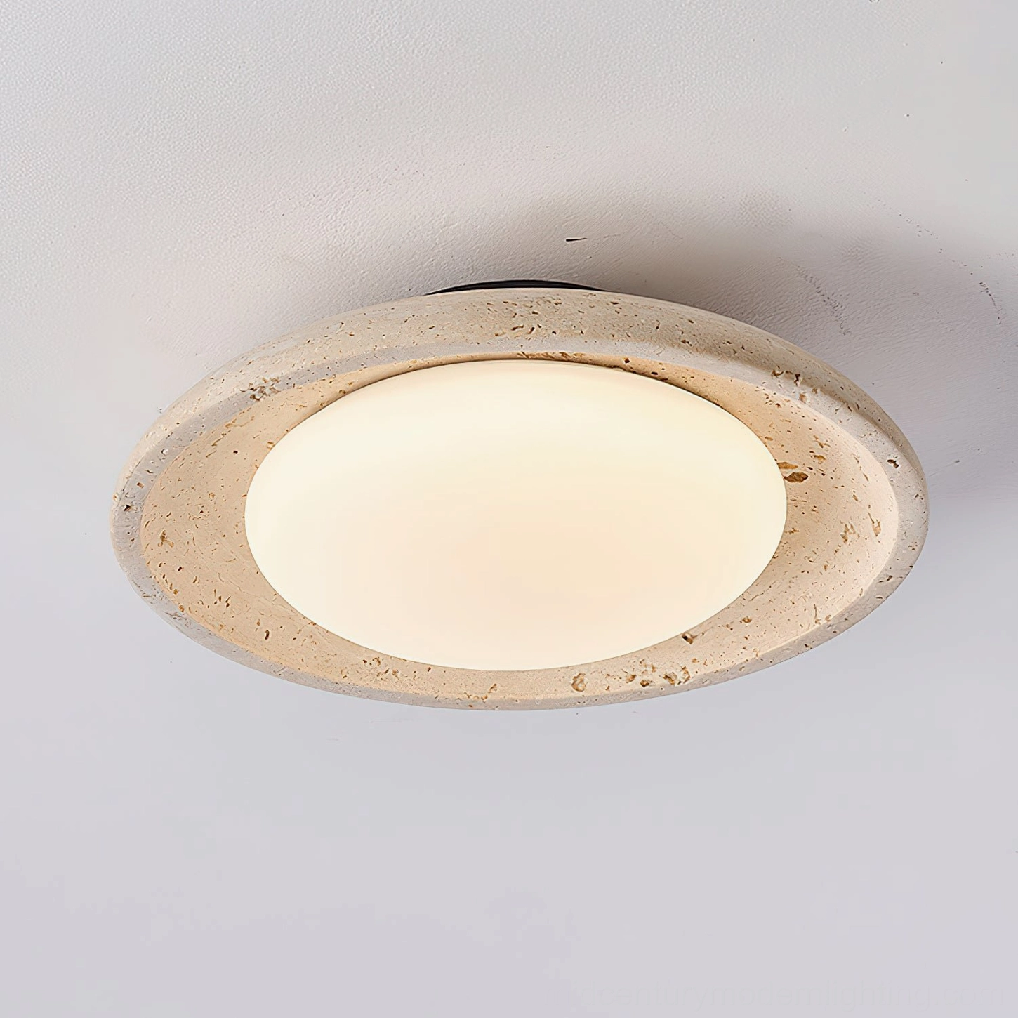 Solis Travertine Ceiling Mount studio product shot beige travertine stone frame black mounting base frosted acrylic