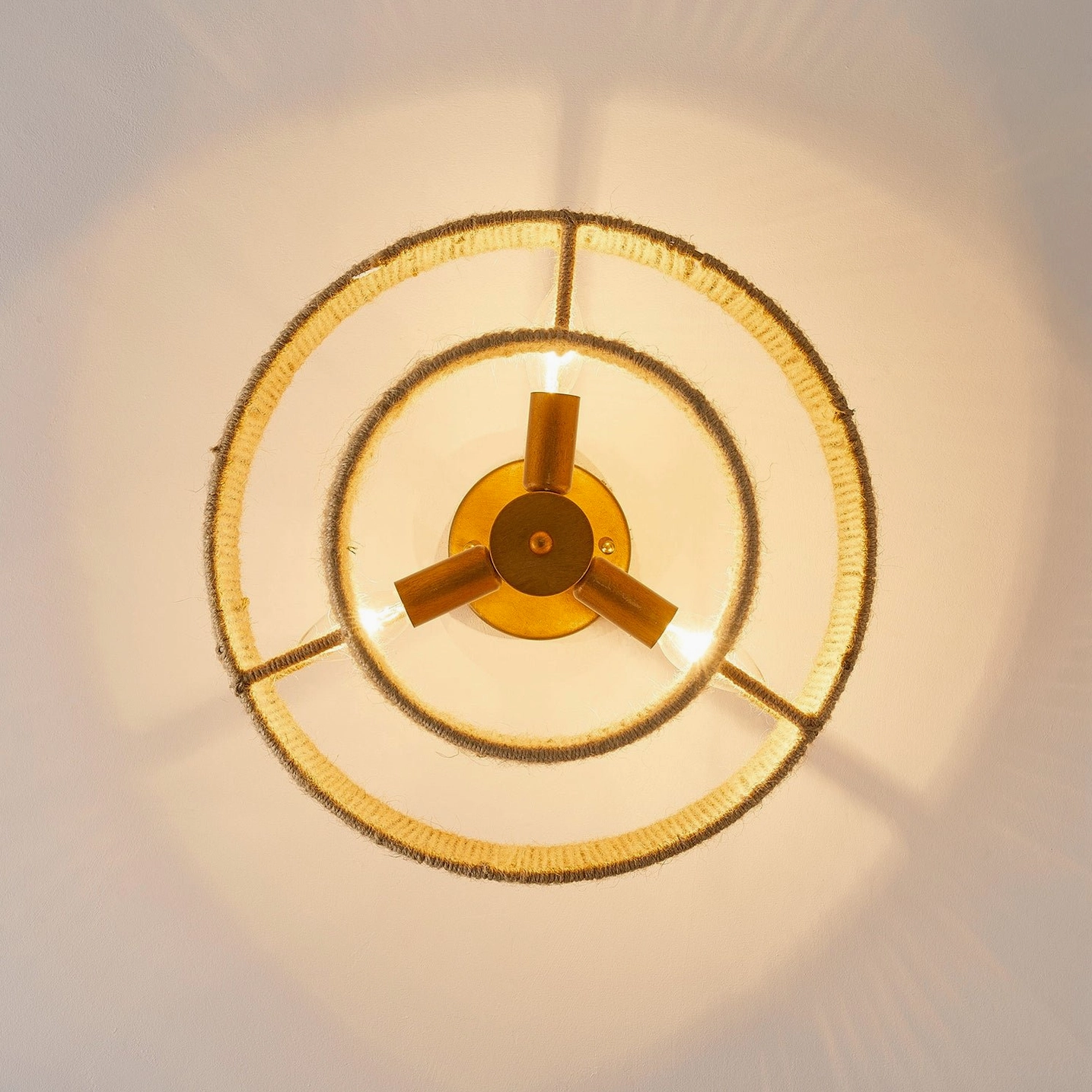 Solmaz two-tier hemp rope ceiling pendant lamp from angled perspective showing sculptural mid-century modern design
